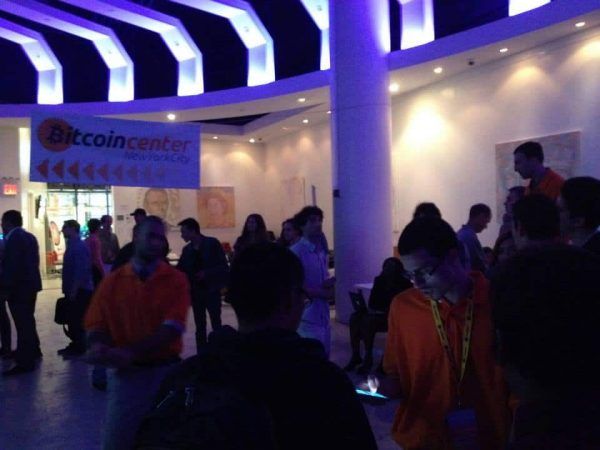 The dimly-lit trading floor of the NYC Bitcoin Center