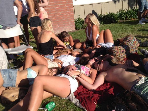 Deltopia Party Goers having a rest after drinking since mid-morning